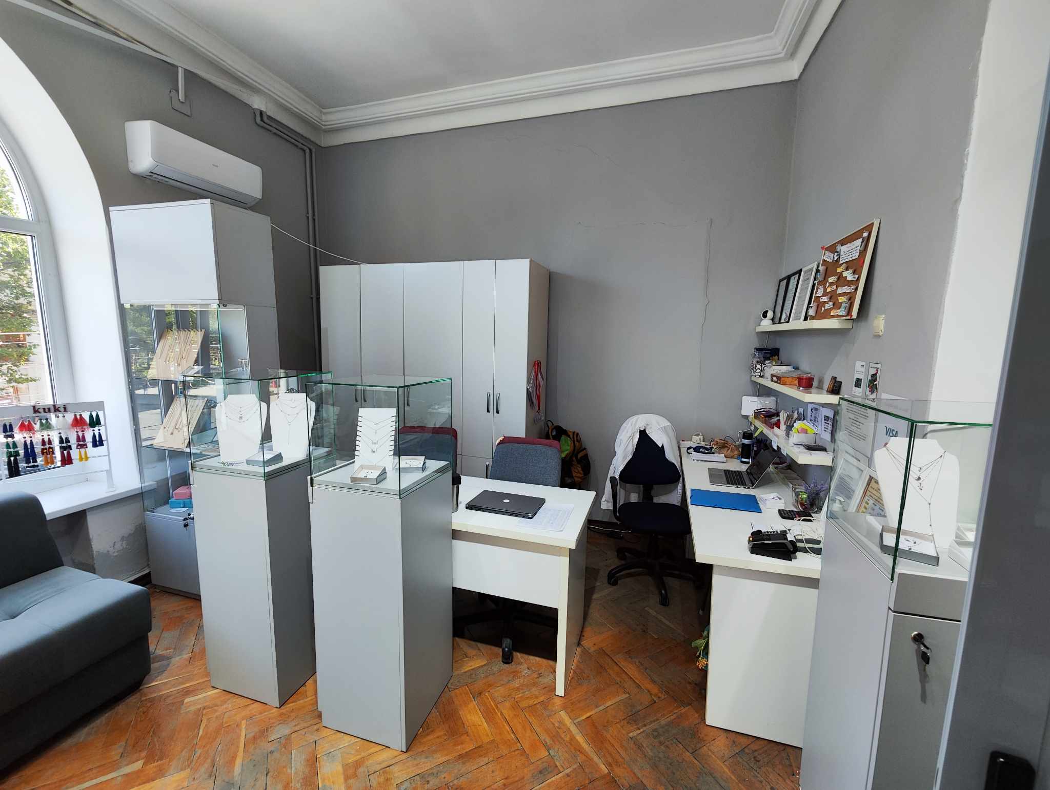 Picture of jewelry shop within an office area. 